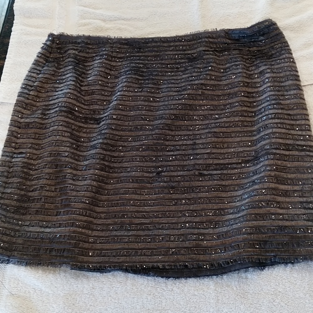 Grey metallic skirt. 15" length.